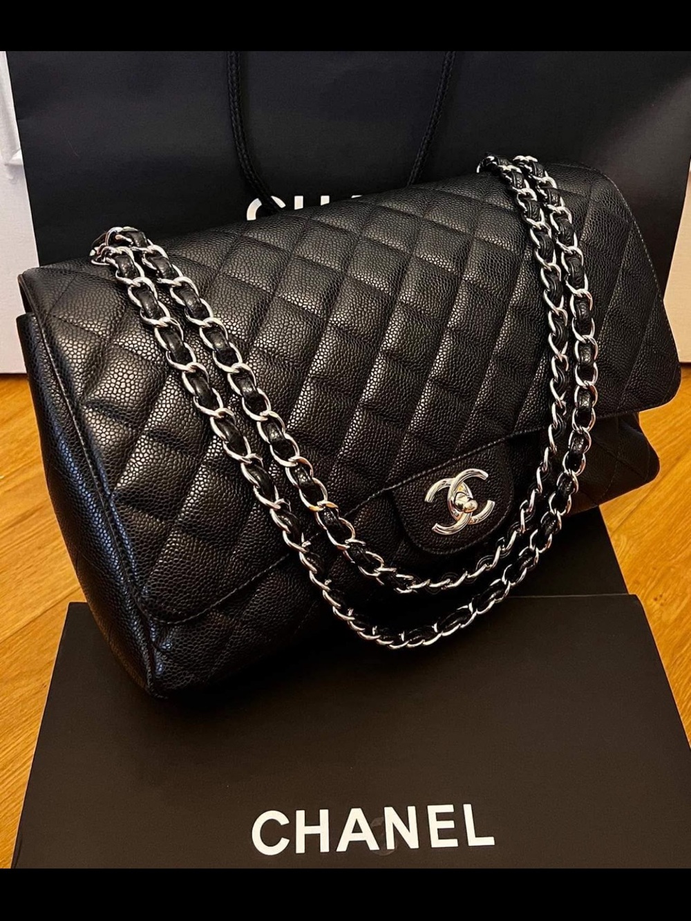 CHANEL Black Quilted Leather Shoulder Bag with Silver-Tone Chain